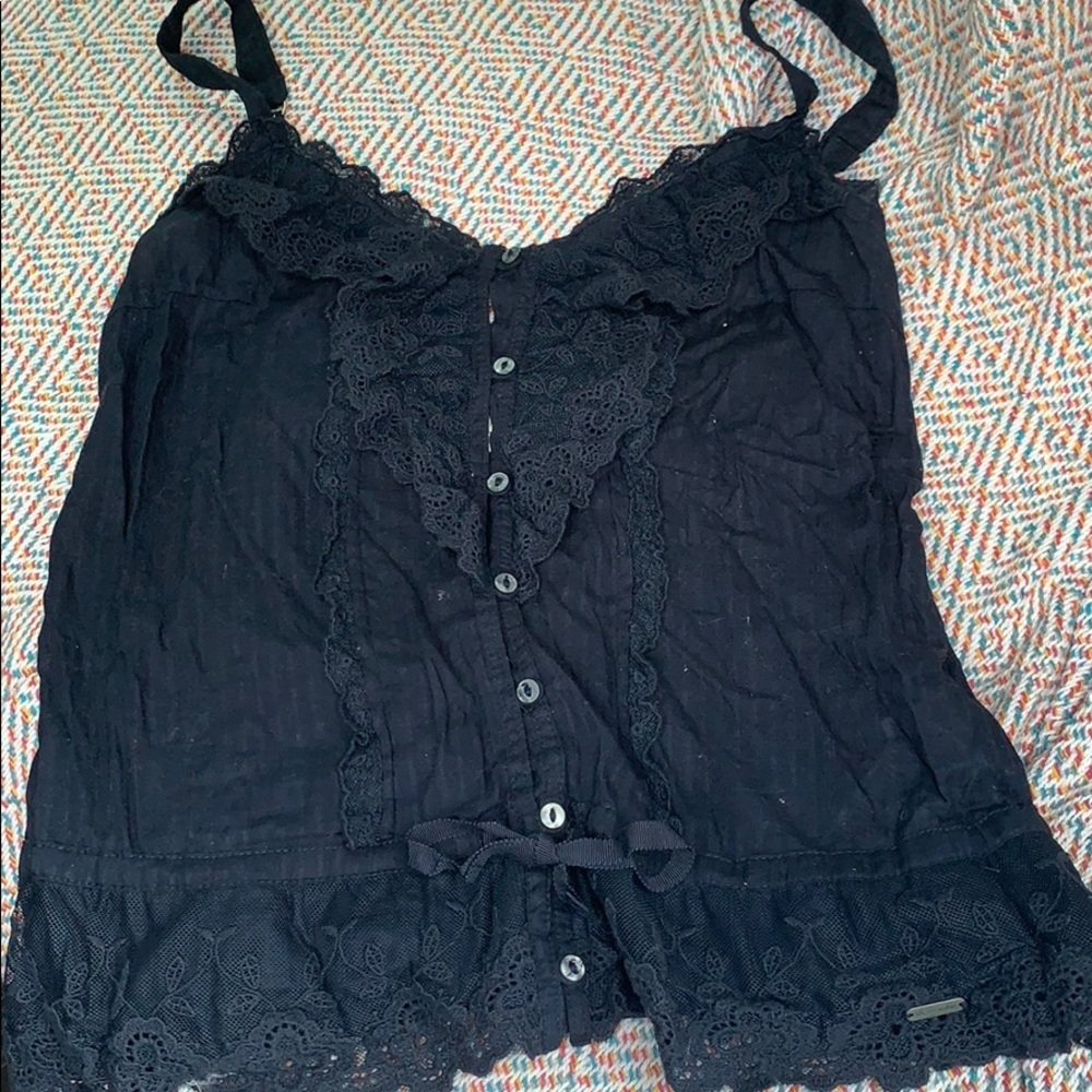 Navy blue lace embellished top.